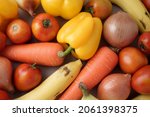 Small photo of Variety red, yellow colored vegetables, fruits flat lay, knolling. For organic, prebiotics, reducing estrogen dominance, keto, paleo food, immune boosting, world food day with plant based sources.