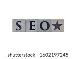 Wooden cubes showing the word SEO with white background, for designs and layouts