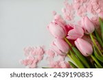 A bouquet of pink tulips and...