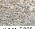 Small photo of Brick and stone wall. Aleatory mix