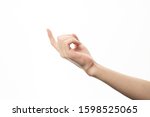 Small photo of Human hand in seduce gesture isolate on white background