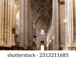 Small photo of Segovia, Spain, 03.10.21. Segovia Cathedral inside view of the main nave, decorative Gothic vaults and stained glass windows, Segovia, Spain.