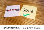 Small photo of London, UK - 15 February 2021: sticky notes with LIBOR and SOFR, where the latter will replace the former as the base rate for financial products