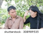 Small photo of Asian couple Woman slapping man senior middle age accost, philander senior couple