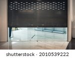 Abamdomed roll shutter gate of shop closing in department store due economic condition