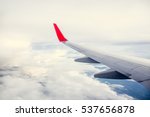 Morning cloudy sunrise with Wing of an airplane. picture for add text message or frame website. Traveling concept