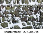 Dry Stone Wall In Winter Snow
