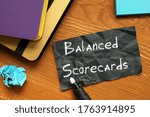 Small photo of Business concept meaning Balanced Scorecards with sign on the sheet.