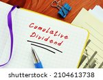 Small photo of Financial concept meaning Cumulative Dividend with phrase on the page.