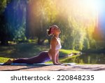 Young woman doing yoga in...