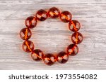 Bracelet of natural brandy amber, beads with a diameter of 18mm diamond cut, in bracelet 12 beads