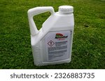 Small photo of Alfeld, Germany, July 4, 2023 - A canister of Roundup, a weed killer, with Polish inscription