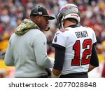 Small photo of Nov 14, 2021; Landover, MD USA; Tampa Bay Buccaneers offensive coordinator Byron Leftwich talks with quarterback Tom Brady (12) during an NFL game at FedEx Field. (Steve Jacobson, Image of Sport)