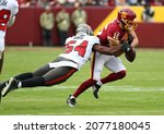 Small photo of Nov 14, 2021; Landover, MD USA; Tampa Bay Buccaneers linebacker Lavonte David (54) forces a fumble during an NFL game at FedEx Field. (Steve Jacobson, Image of Sport)