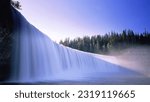 Lady Evelyn Falls in Northwest Canada. Awe-inspiring falls cascade over cliffs in Lady Evelyn Falls Territorial Park Popular spot for hiking, camping, fishing, and remote waterfall projects