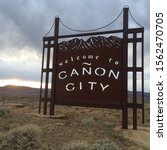 Small photo of Welcome to canon city colorado sign The prison capital also known as the balky of the dammed