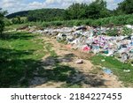 Small photo of View of the landfill. Landfill A pile of plastic garbage, food waste and other garbage. Pollution of nature. A sea of ​​garbage begins to invade and destroy beautiful landscapes