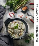 Small photo of Laksam, special noodle with coconut gravy and fish. It served with chili paste and fresh vegetables as condiment . Popular traditional food in Kelantan, Malaysia .