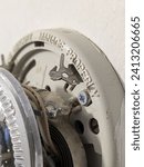 Small photo of Mercury Thermostat with cover removed to show warning label and mercury in electrical switch