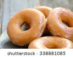 Glazed donuts background image. Macro with shallow dof.
