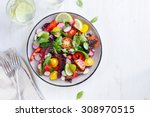 Salad with fresh summer vegetables, top view