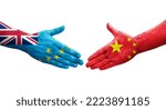 Small photo of Handshake between Tuvalu and China flags painted on hands, isolated transparent image.