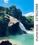 Small photo of Turner Falls in Oklahoma. This beauty flows through the Arbuckle Mountains. It’s a 77 ft.waterfall that flows into its own natural pool.