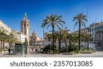 Small photo of Valencia, Spain - 21-08-2023 Reina Square - Reina Cathedral. La cathedral de la Reina on La plaza de la Reina. The bell tower Micalet, Miguelete.