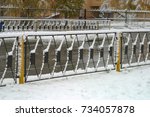 Black And Yellow Iron Fence At...