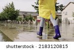 Girl In Raincoats Rubber Boots...