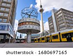 Small photo of Berlin, Germany - 21.03.2020: panoramic view on the Urania World Clock in Berlin and TV Tower on the Alexander Square, a tourist attraction and meeting place