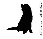vector silhouette of a dog on a ... | Shutterstock .eps vector #1703120575