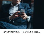 Unrecognizable business man using phone stock photo
