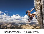 Female Climber Dangles From The ...