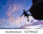 Rock Climber Rappells From The...
