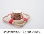 Stacked Coins In Red Lifebuoy...