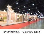 Small photo of Abstract blur people in exhibition hall event trade show expo background. Large international exhibition, convention center, business marketing and event fair organizer concept.