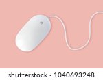 Simple white computer mouse with cord isolated on pastel pink background, minimal style