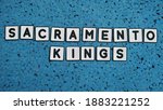 sacremento kings, word cube with backgraund blue