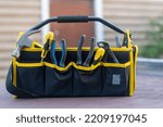 A black and yellow bag with...