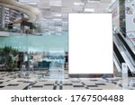 Blank advertising banner mockup in modern airport retail environment; large digital display screen. Billboard, poster, out-of-home OOH media display space.