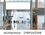 Blank advertising banner, billboard mockup in generic modern interior or airport environment. Large digital display screen, an out-of-home OOH media display space