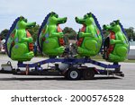 Carnival Ride With Green Dragons