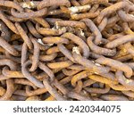 Small photo of a dock anchor iron chain metal rusty chained voyage lock safety weight port anchored closeup rusted connection steel cruise marine vessel ship sailing navy link rough strong oxidized vintage nautical