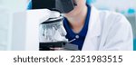 Small photo of Scientist in laboratory use microscope delving into the realms of biology, biotechnology, and microbiology with expertise in chemistry, medicine, research involves meticulous experiments and analysis