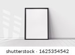 White poster with blank frame...