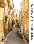 Small photo of A look along a typical Italian alleyway, in Enna, Sicily.