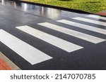 Small photo of Nobody on crosswalk in clack and white crosswalk lines