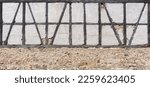 Small photo of Ruinous half-timbered above an old stone wall - facade of a run-down barn in close-up