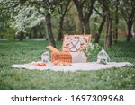 
a cozy picnic in nature, in the park, a summer picnic in the countryside,
picnic basket, photo shoot of flowering apple trees